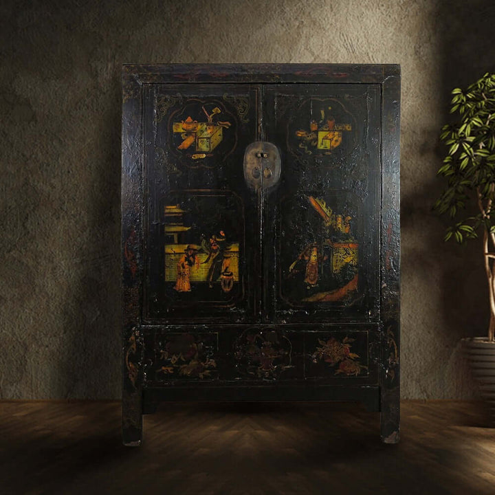 Decorative wooden cabinet with intricate designs in a dimly lit room
