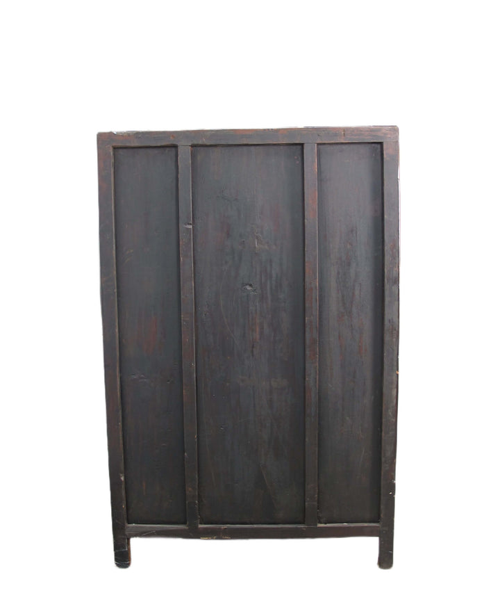 Dark wooden cabinet with three panels on a white background