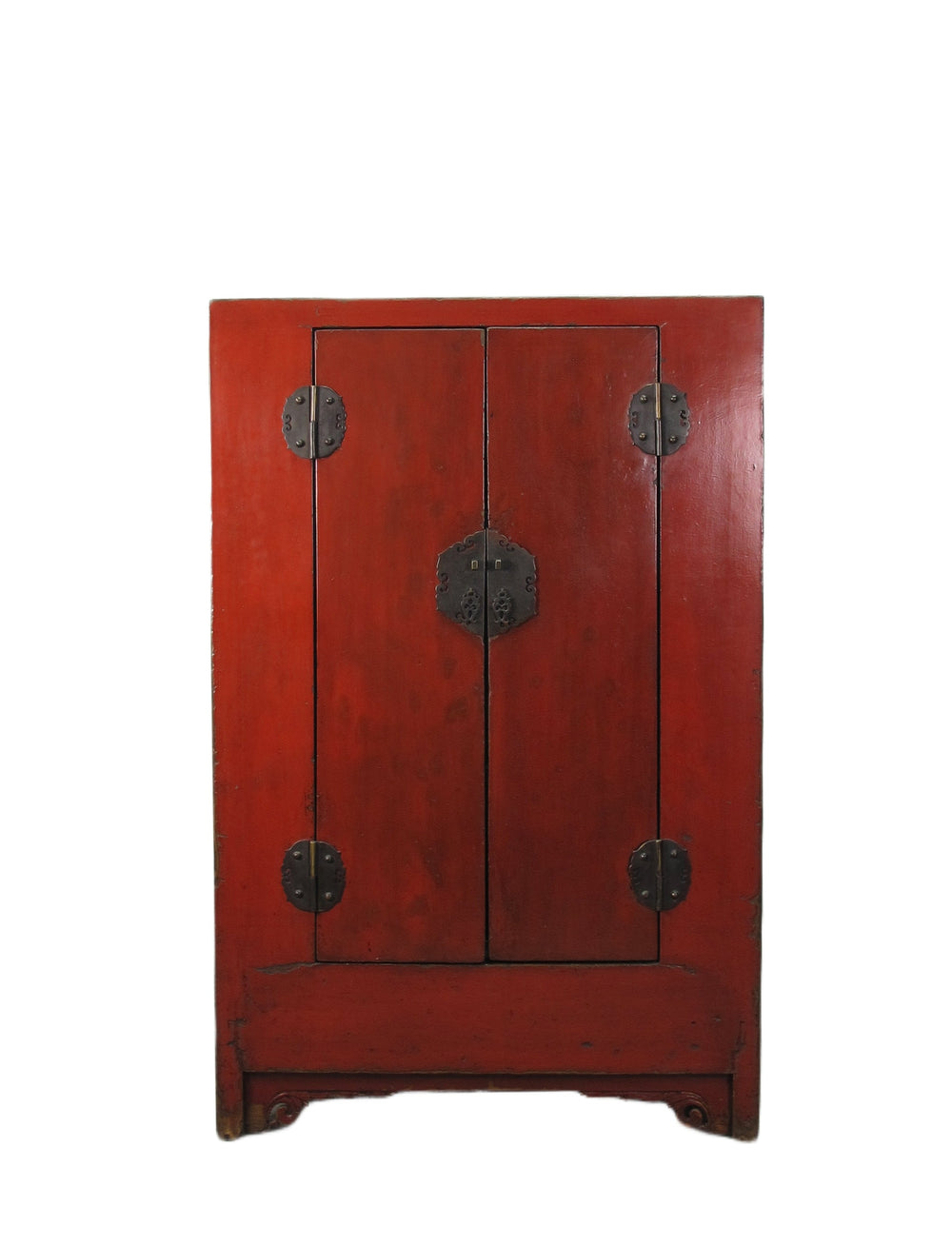 Red wooden cabinet with metal handles on a white background