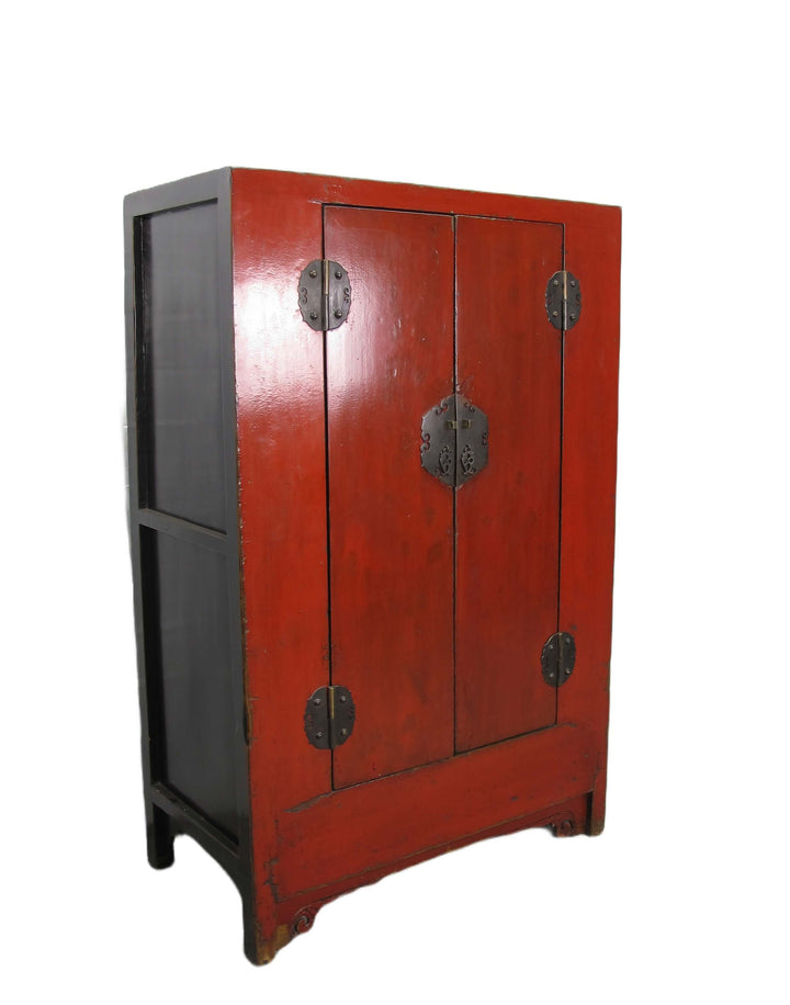 Red wooden cabinet with black accents on a white background