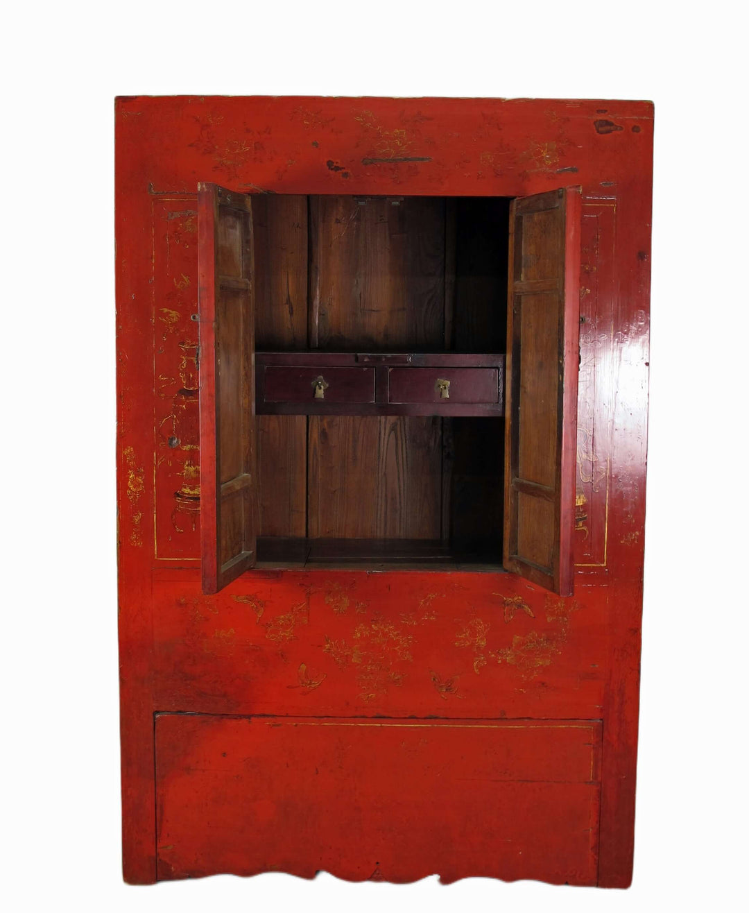 Vintage wooden cabinet with red painted exterior on a white background