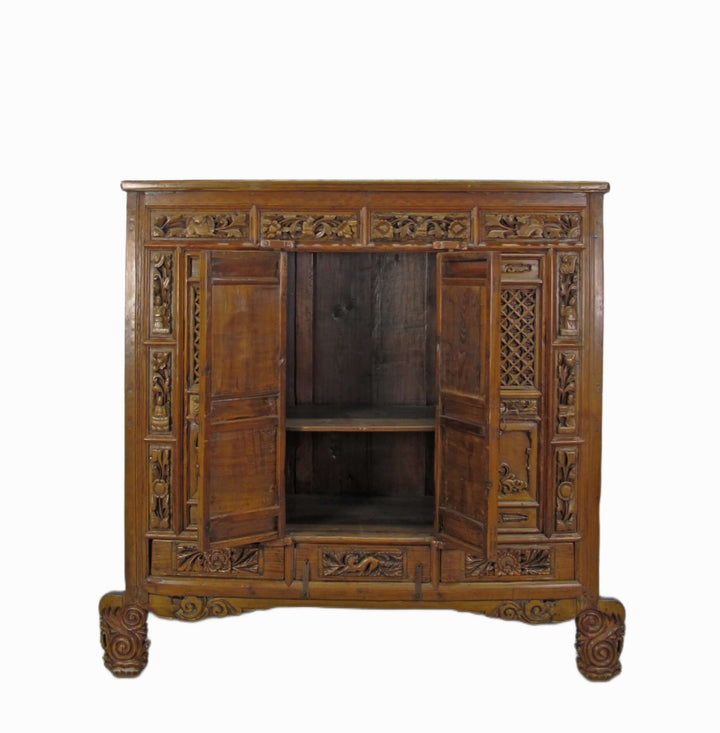 Carved wooden cabinet with open doors on a white background