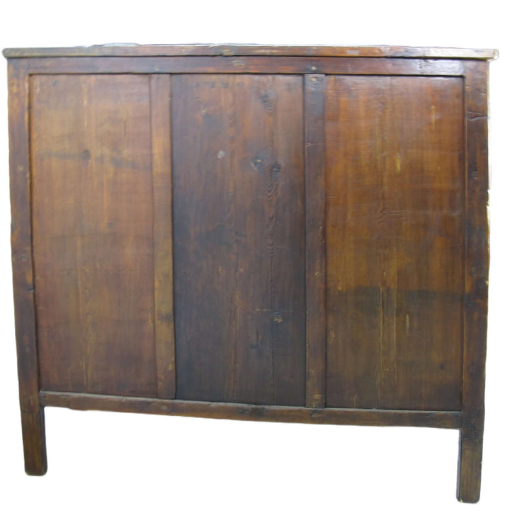 Vintage wooden cabinet with three doors on a white background