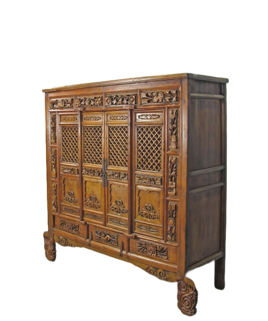 Decorative wooden cabinet with intricate carvings on a white background