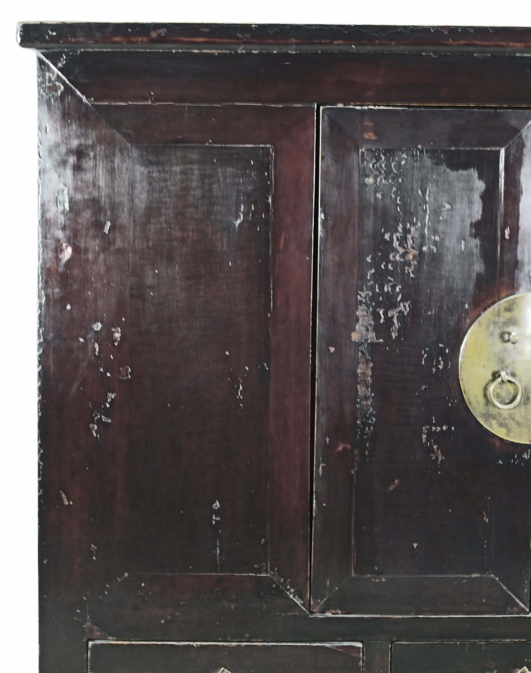 Vintage wooden cabinet with a brass handle