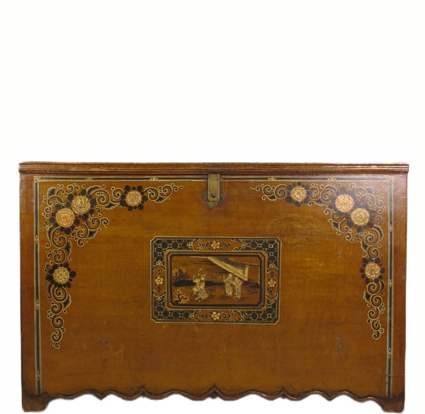 Decorative wooden trunk with intricate designs on a white background