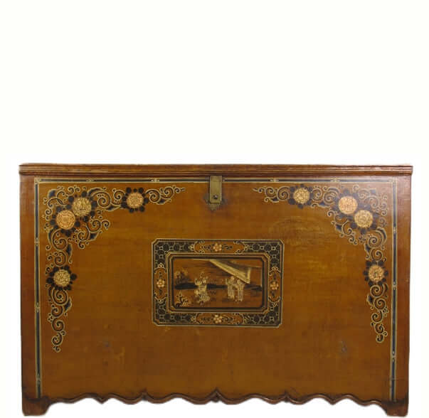 Decorative wooden trunk with intricate designs on a white background