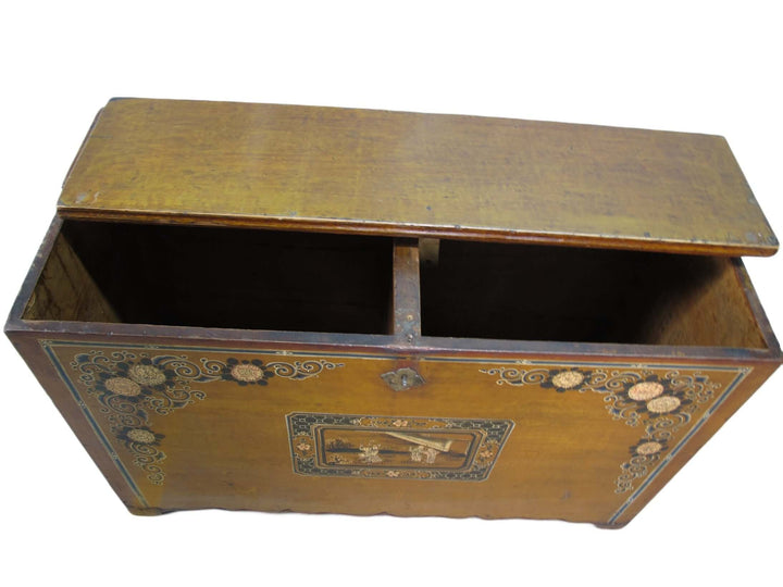 Wooden chest with decorative elements on a white background