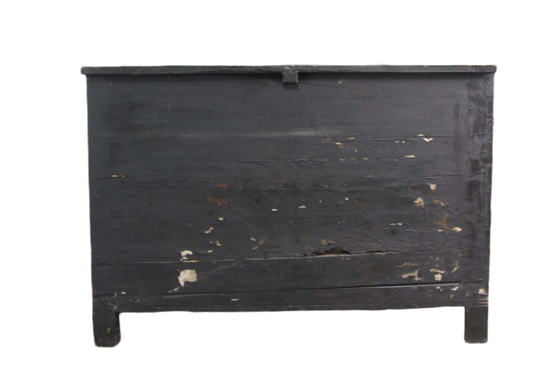 Vintage black wooden chest on a white background