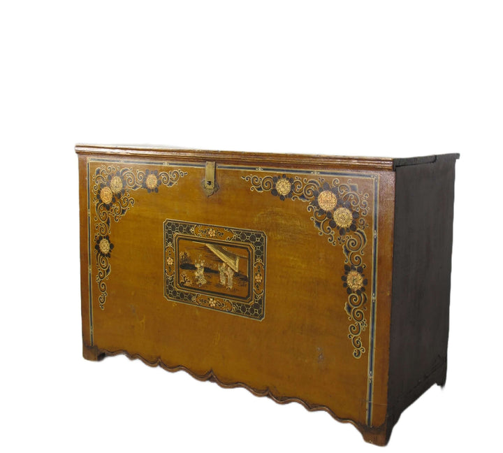 Decorative wooden chest with intricate patterns on a white background