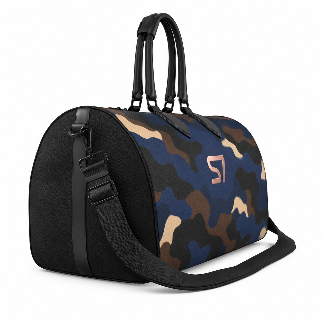 S7 Midnight Terrain leather duffle bag with midnight-blue, navy, beige, brown and black camouflage, a centered rose-gold S7 monogram and black trim.