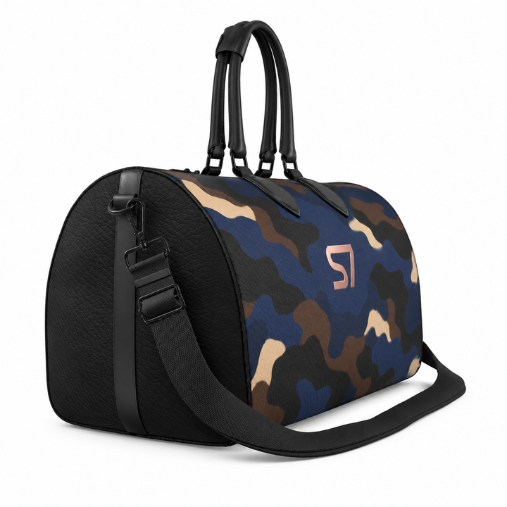 S7 Midnight Terrain leather duffle bag with midnight-blue, navy, beige, brown and black camouflage, a centered rose-gold S7 monogram and black trim.