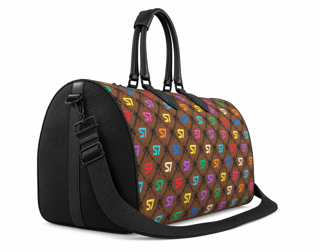 S7 Café Chromatique duffle bag with multicolor S7 monograms, coffee-brown background, black ornate lattice, black side panels, and shoulder strap.