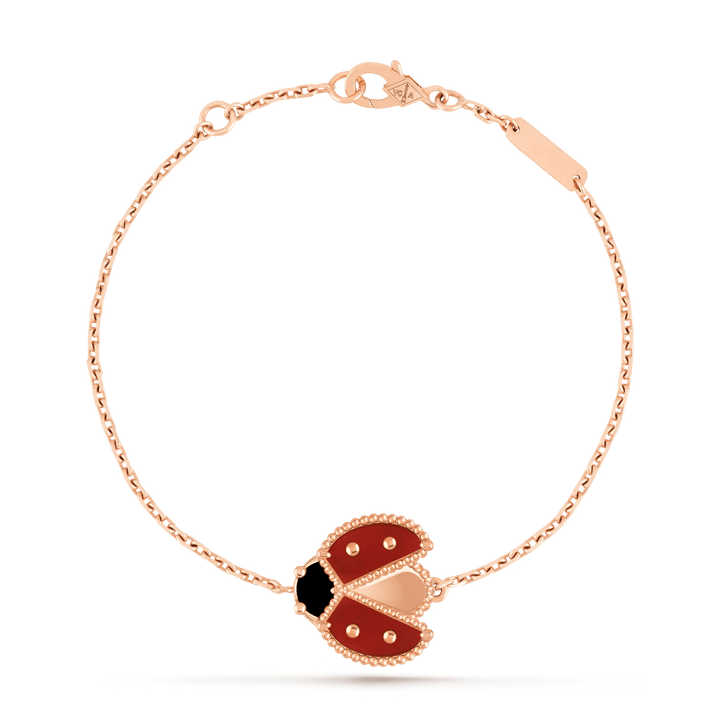 Van Cleef & Arpels Lucky Spring bracelet, open wings ladybug 18K rose gold, Carnelian, Onyx on a delicate chain.