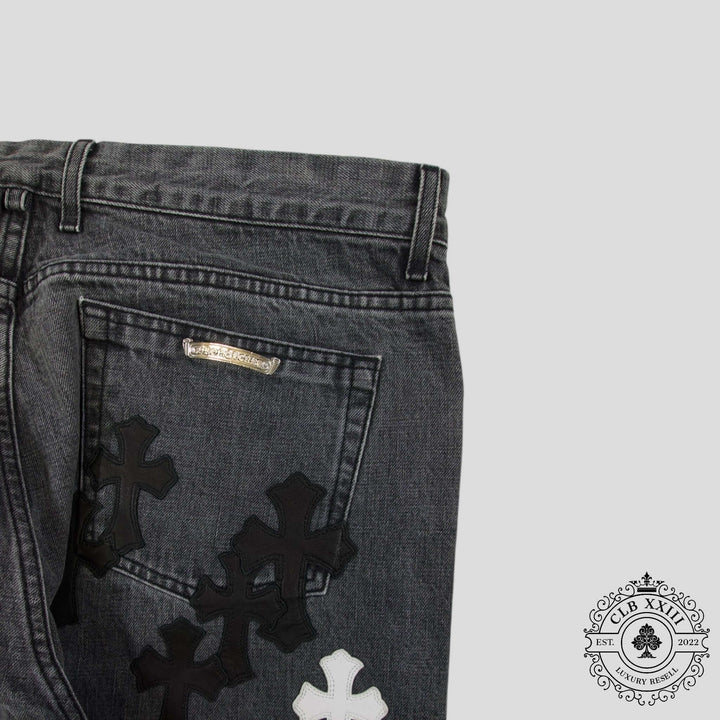 Chrome Heart Fleur Knee Denim in Black/White featuring unique leather accents, a rare find in luxury denim jeans.