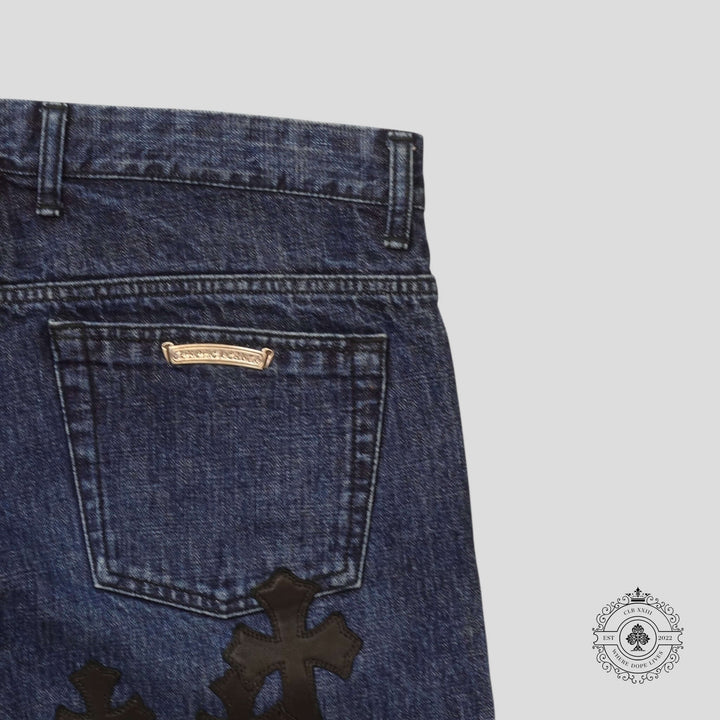 Chrome Hearts Fleur Knee Cross Patch Jeans in Dark Wash/Black showcasing luxury denim craftsmanship and authentic design details.