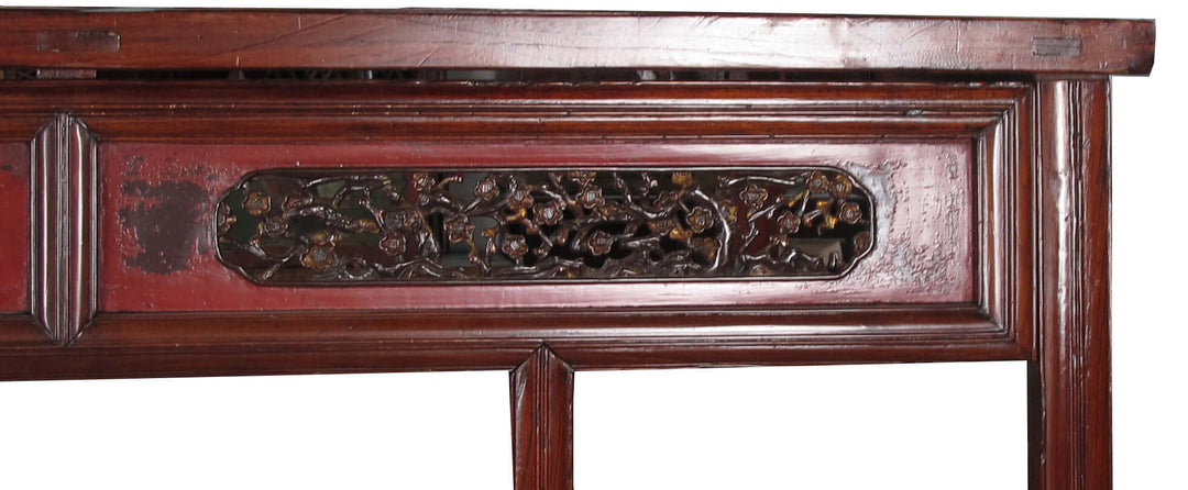 Wooden furniture with intricate carvings on a white background