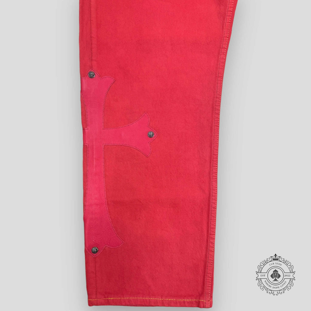 Red pants with a fish design on a gray background