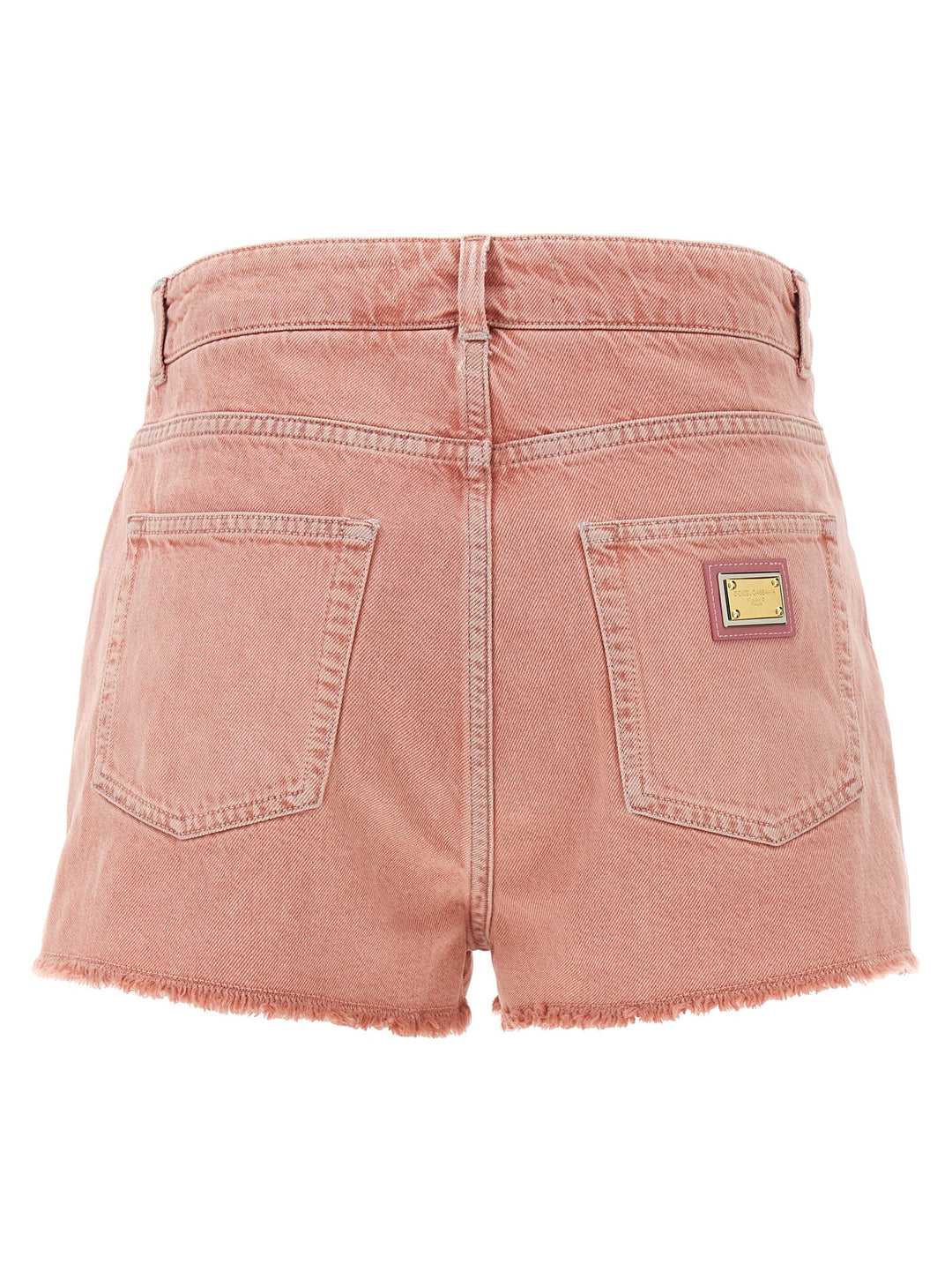 Pink denim shorts with a brand label on a white background
