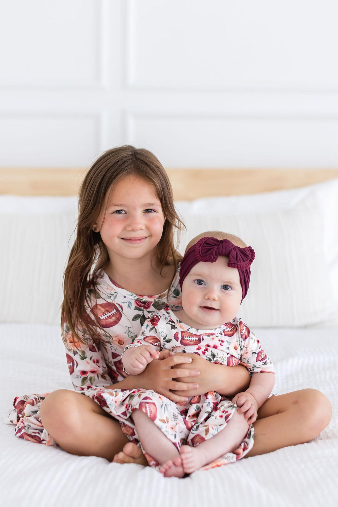 Footballs &amp; Flowers 3/4 Sleeve Twirl Bodysuit