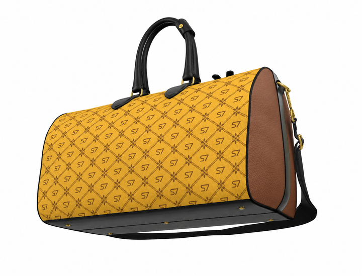A yellow duffel bag with a repeating black monogram pattern, brown leather side panels, black handles, and a black base, shown on a plain white background.
