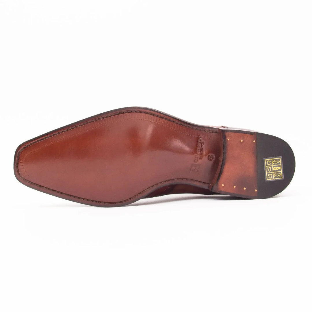 Goodyear welt derby shoes Brogue style Brown bottom view showing glossy calfskin sole with embossed logo and brass nails.