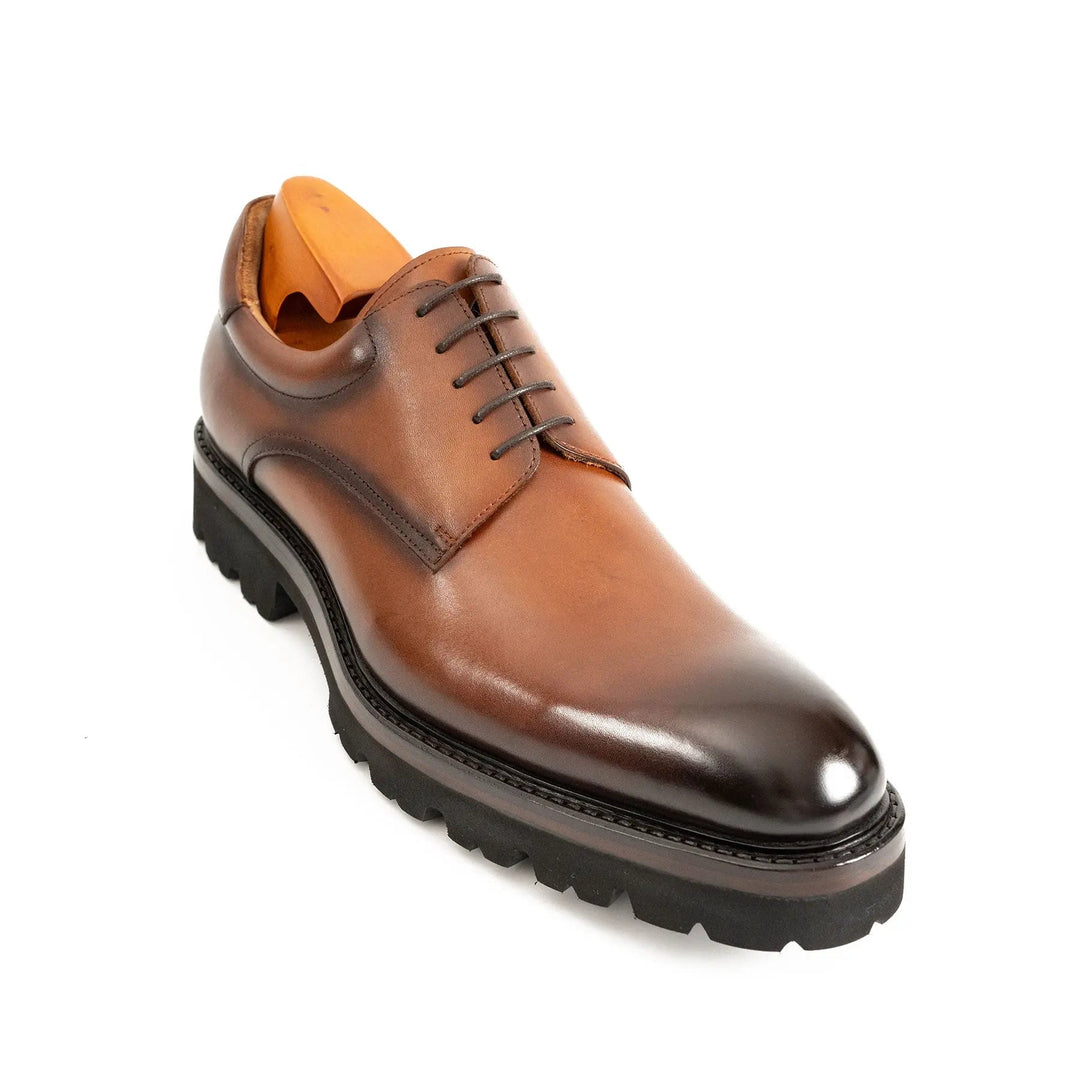 Handmade Goodyear Welted Derby Shoes in rich brown polished leather, featuring lace-up design and durable lug sole. DV DIVINCH.