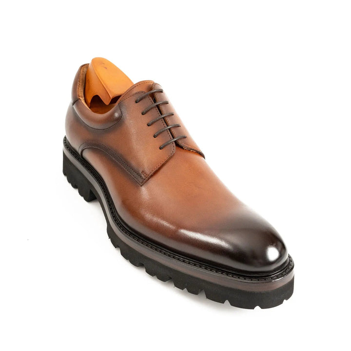 Handmade Goodyear Welted Derby Shoes in rich brown polished leather, featuring lace-up design and durable lug sole. DV DIVINCH.
