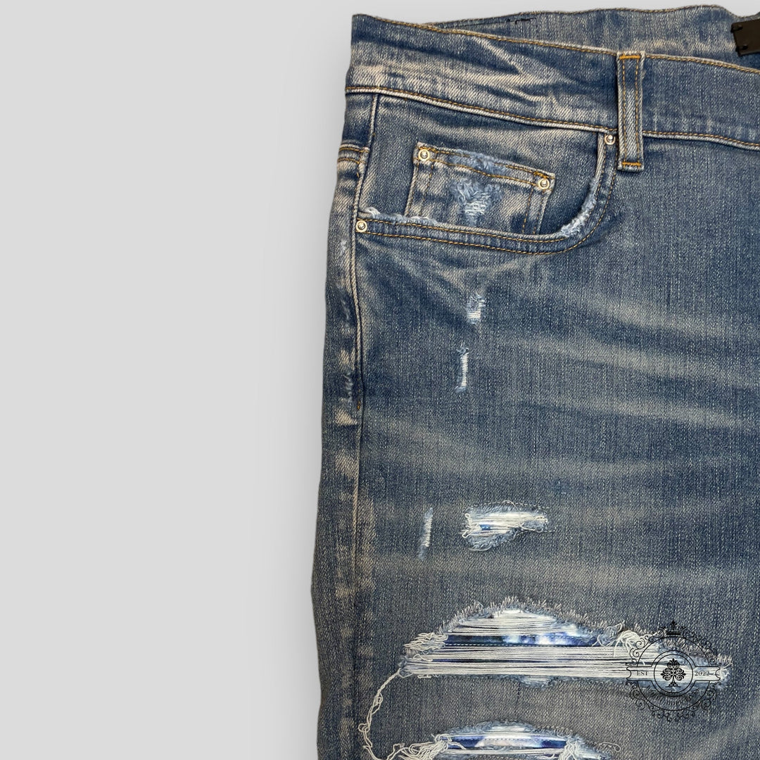 Amiri Tie Dye Bandana Thrasher Jeans in Clay Indigo