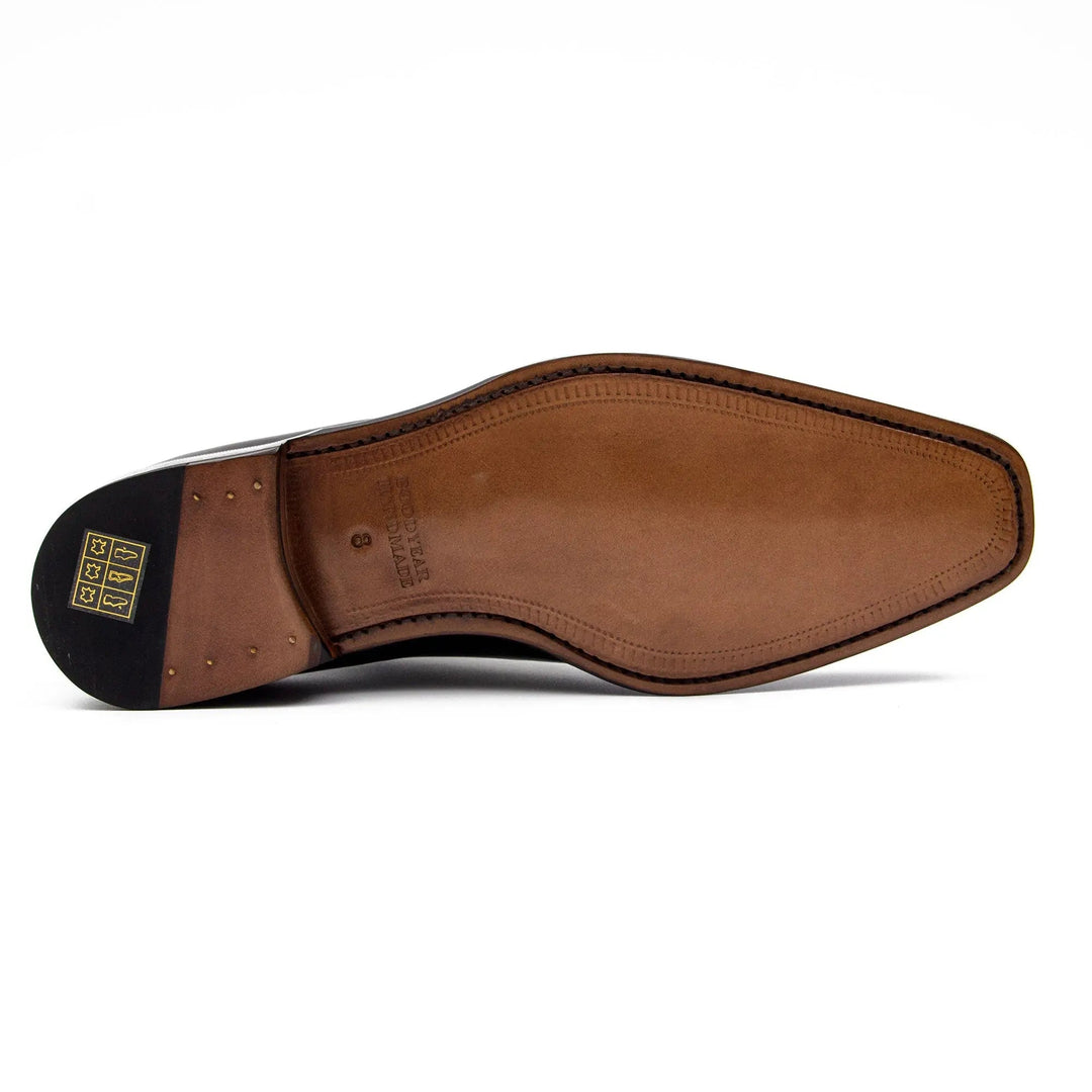 Sole view of Goodyear Brown leather loafer with horsebit, handcrafted calfskin, featuring smooth brown leather finish.