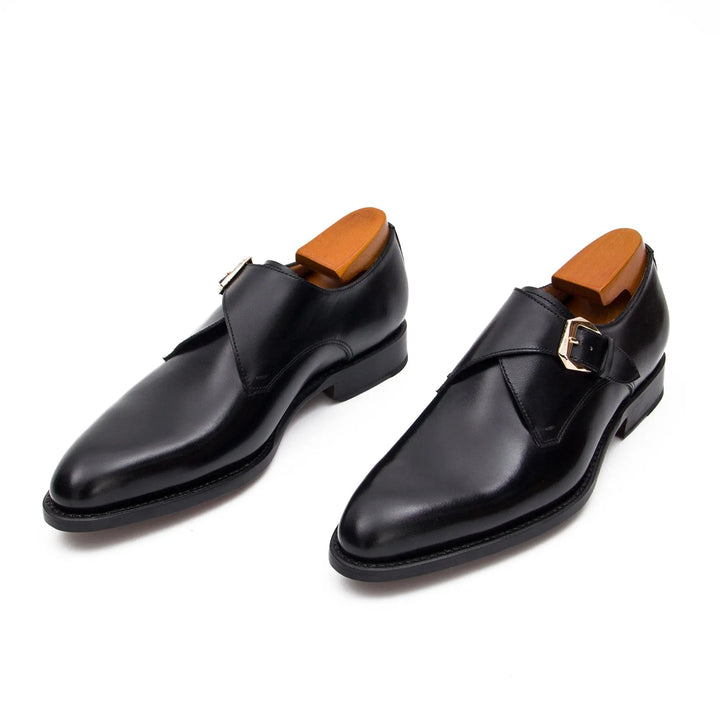 Goodyear Welted Calfskin Monk Strap Shoes by DV DIVINCH, black handcrafted leather, side view with buckle detail.