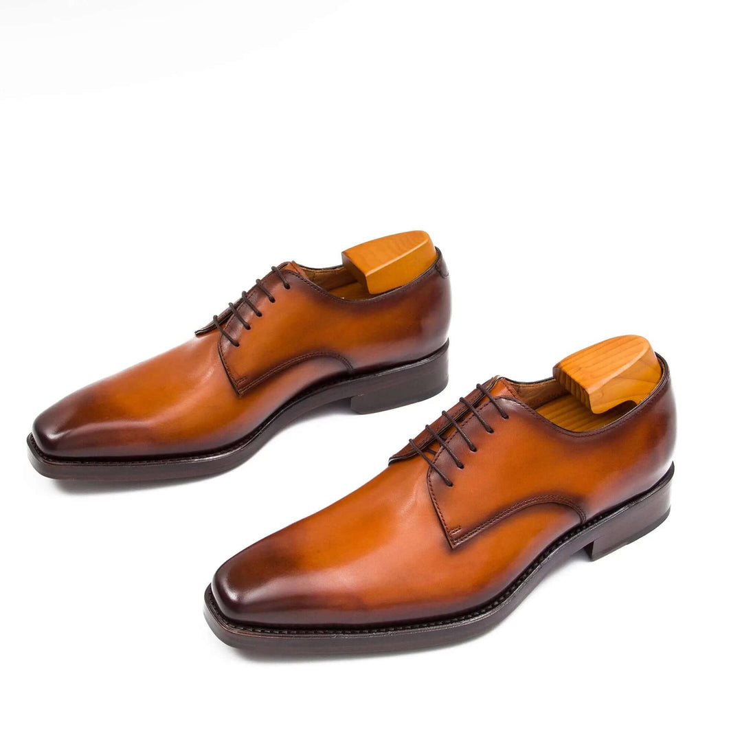 Goodyear Handmade Leather Derby Shoes in brown calfskin with sleek design and raised stitching details, side view.