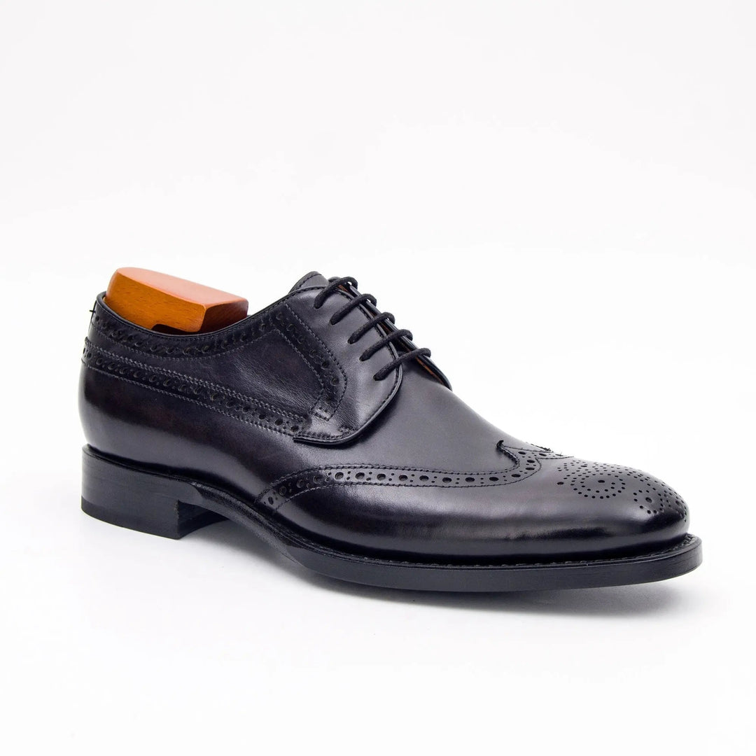 Goodyear Welt Brogue Shoes by DV DIVINCH in black calfskin leather, featuring U-wing toe design and brogue perforations.