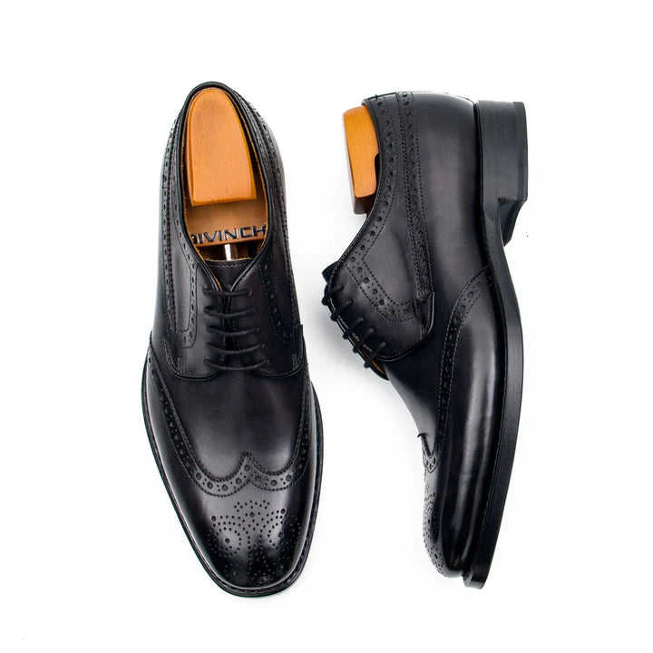Goodyear Welt Brogue Shoes by DV DIVINCH, black handcrafted calfskin leather, U-wing design, detailed brogue perforations.