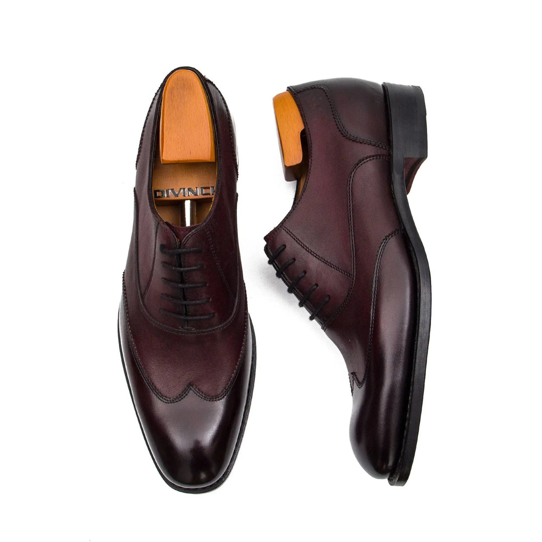 Goodyear Welt Oxford Shoes by DV DIVINCH in dark burgundy calfskin leather with classic lace-up design and detailed stitching.