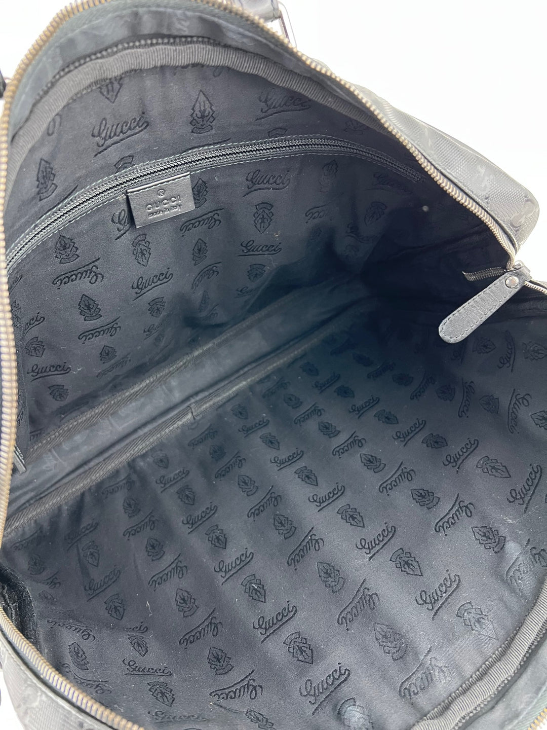 Interior view of Gucci Briefcase GG Imprime Coated Canvas Black Monogram Business Bag Preowned, featuring logo lining.