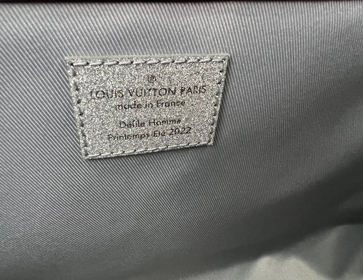 Louis Vuitton Keepall Bandoulière 50B silver glitter Damier duffle bag – STORE 7994