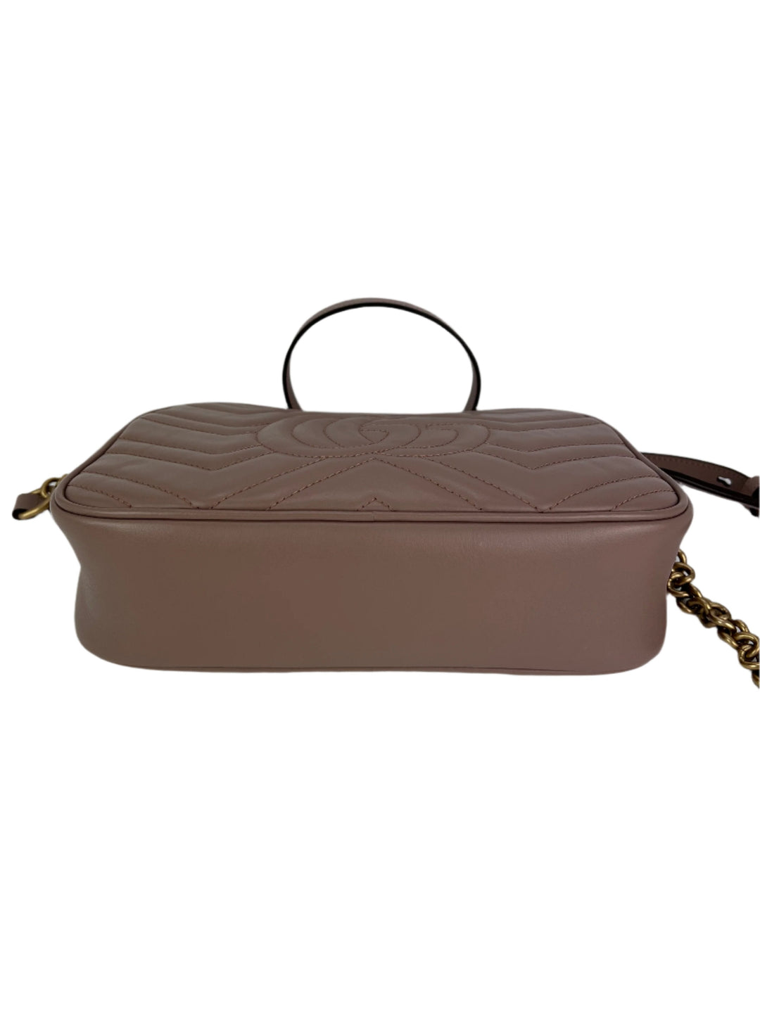Brown leather handbag with a chain detail on a white background
