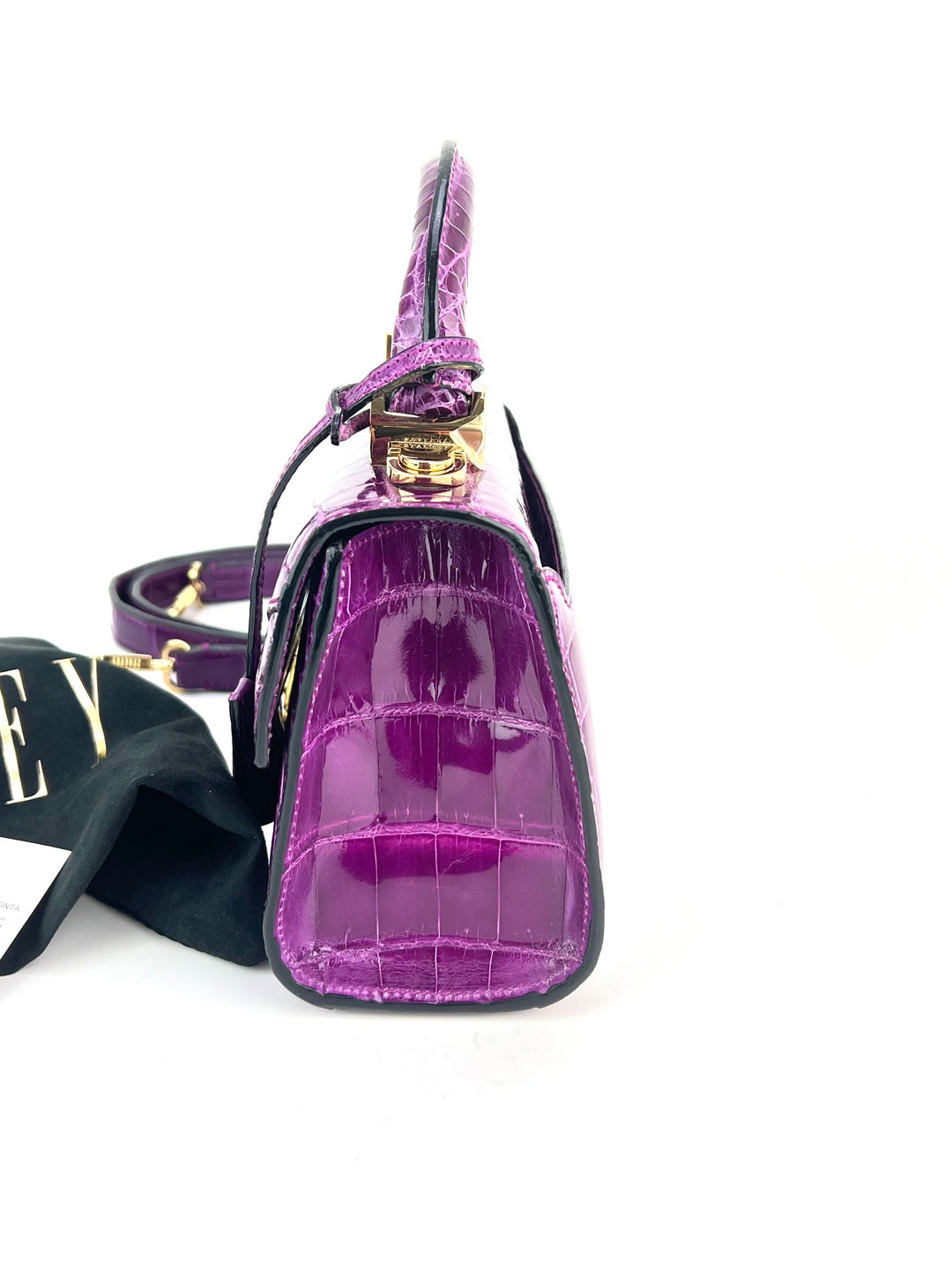 Exclusive Stalvey Top Handle 2.0 Alligator Bag Crossbody Luxury Bag in vibrant purple color and boxy silhouette.