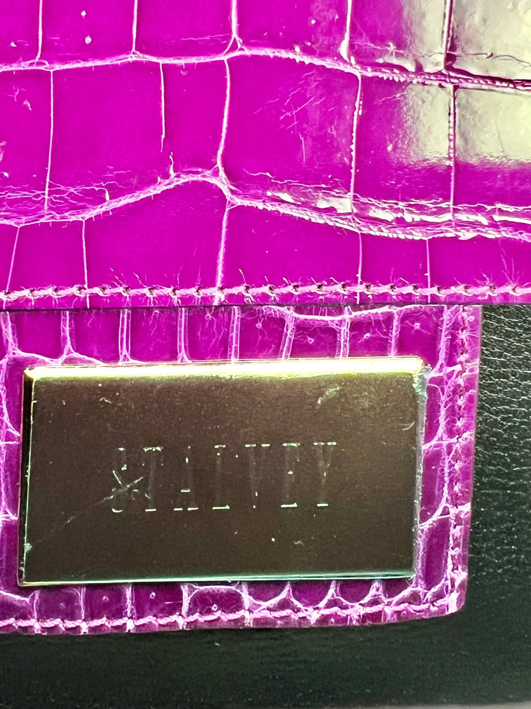 Exclusive Stalvey Top Handle 2.0 Alligator Bag Crossbody Luxury Bag close-up of logo and purple crocodile texture