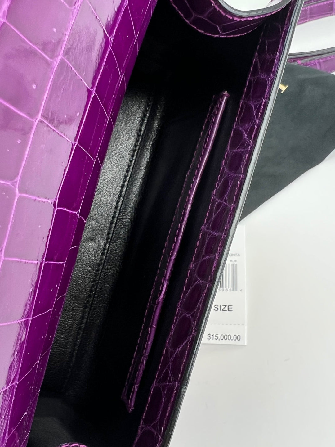 Interior view of the Exclusive Stalvey Top Handle 2.0 Alligator Bag Crossbody Luxury Bag showcasing its rich purple texture.