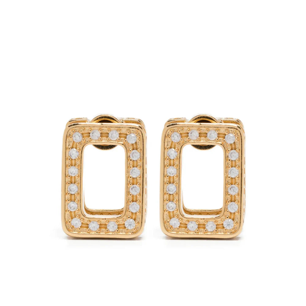 Gold hoop earrings with small diamonds on a white background
