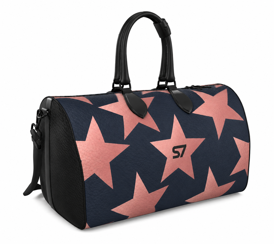 S7 Stella Midnight leather duffle bag with oversized rose-gold stars on midnight blue and a centered black S7 monogram.