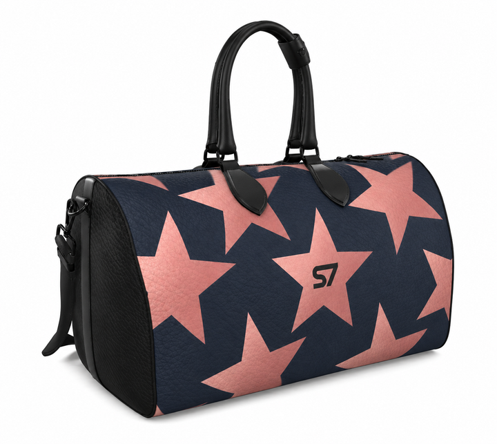 S7 Stella Midnight leather duffle bag with oversized rose-gold stars on midnight blue and a centered black S7 monogram.