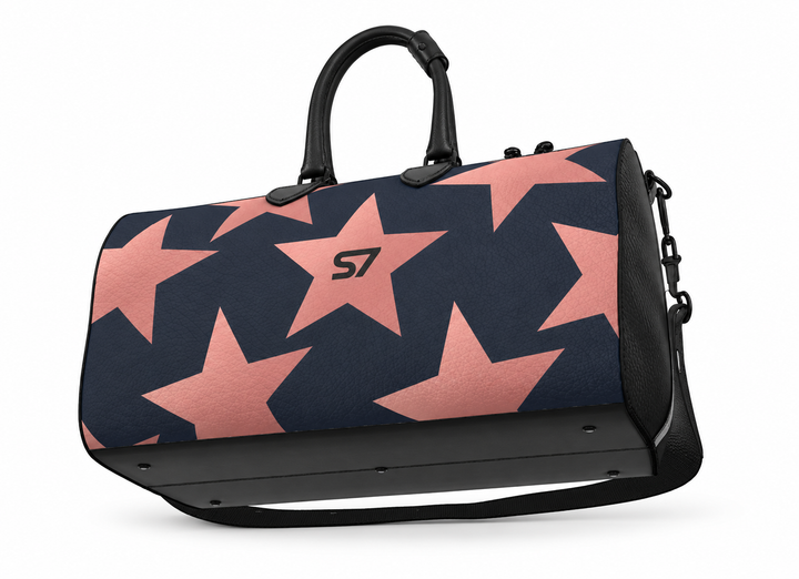 S7 Stella Midnight leather duffle bag with oversized rose-gold stars on midnight blue and a centered black S7 monogram.