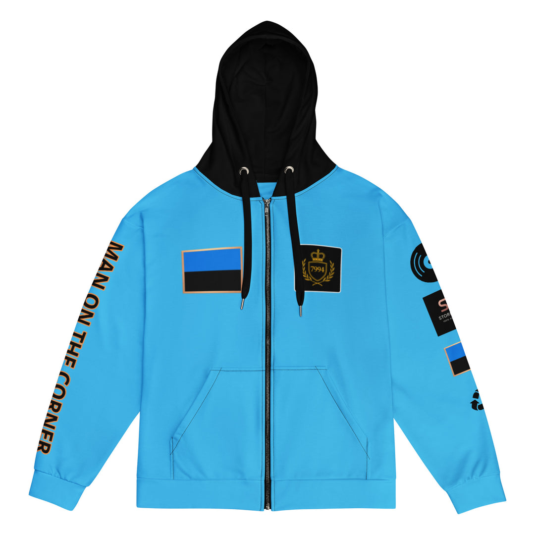 Blue hoodie with black hood and various patches on a white background