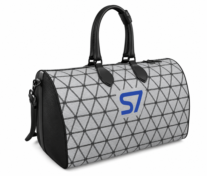 S7 PRISM duffle bag featuring black triangular lattice on a heather-gray background with a single cobalt-blue S7 logo.