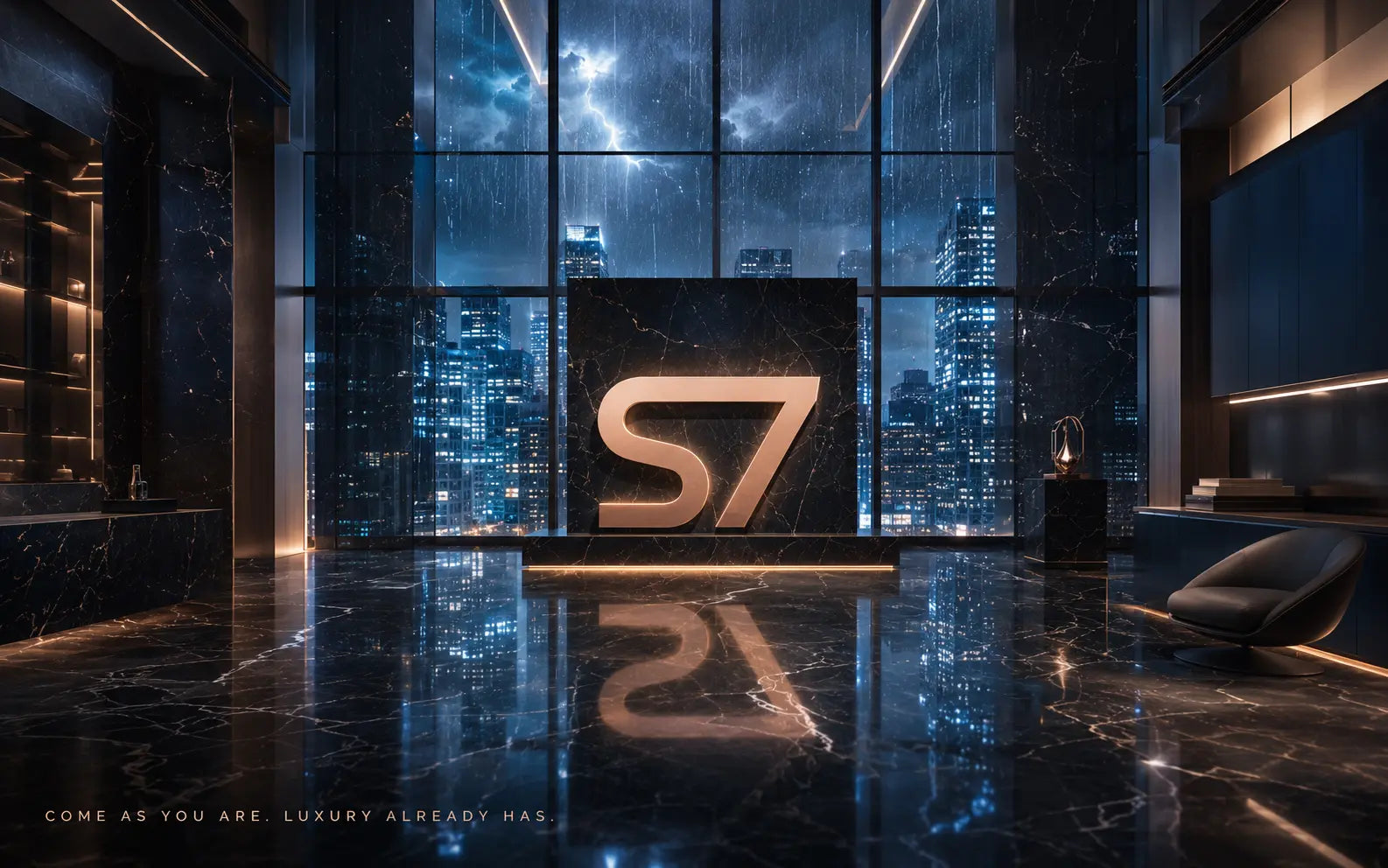 A luxury modern interior with a large illuminated 'S7' sign centered in front of floor-to-ceiling windows showing a city skyline at night. The room has dark marble flooring and walls, ambient lighting, and a sleek chair on the right.