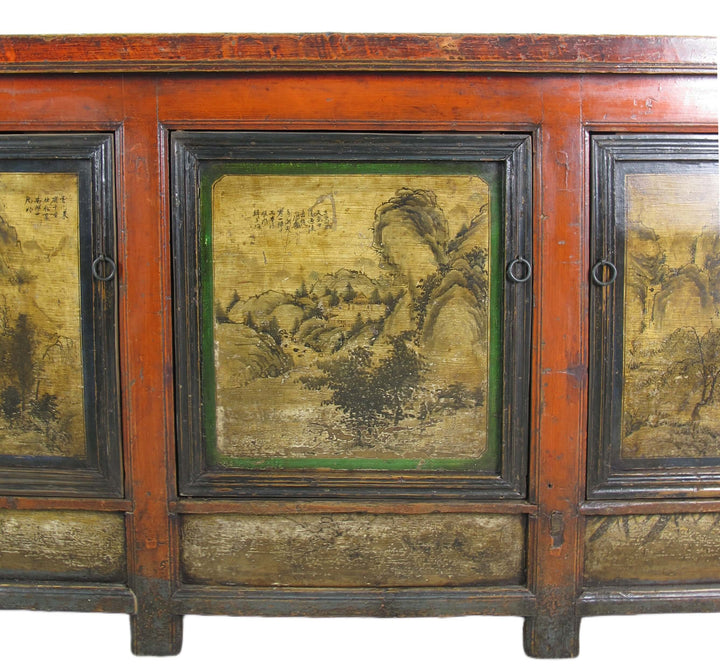 Vintage wooden cabinet with painted panels of landscapes on a white background