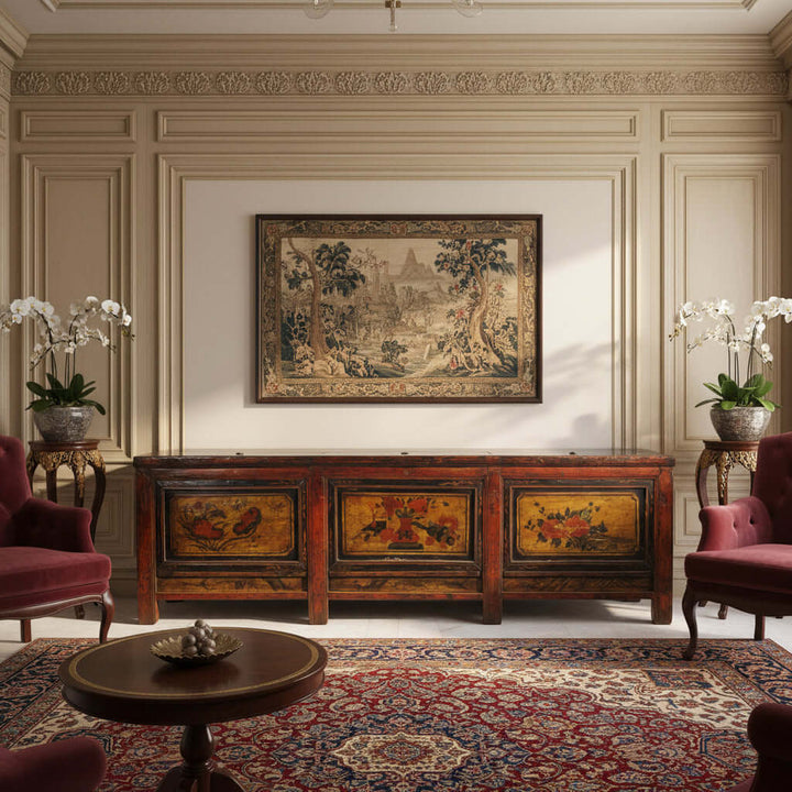 Vintage wooden sideboard with floral and bird designs on a white background